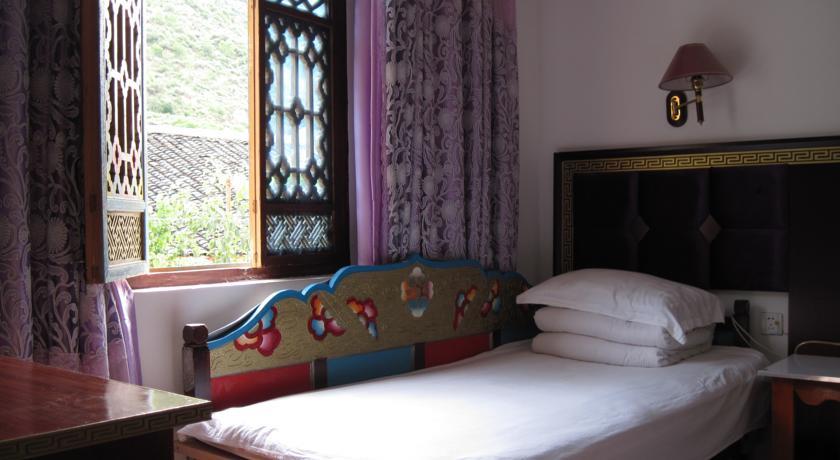 Отель Jiuzhaigou Yougen Inn