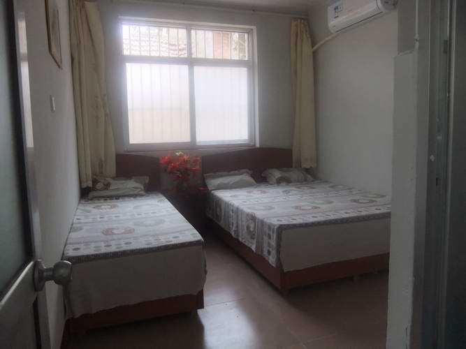 Отель Rizhao Jiaxun Hostel