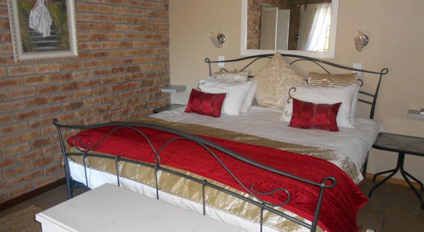 Апартаменты Oukraal Guest Apartments