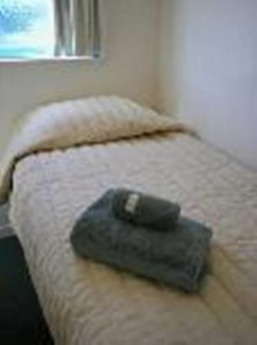 Хостел Microtel YHA Backpackers