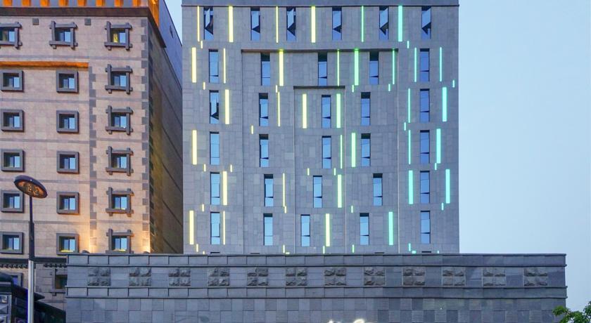 Отель Dongtan Hotel Minos