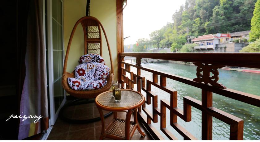 Отель Fenghuang Happy Hotel