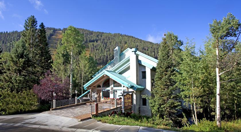 Отель Alpine Village Suites
