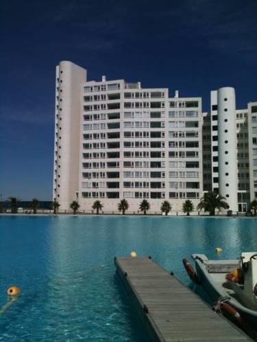Апартаменты Departamento Condominio Olas