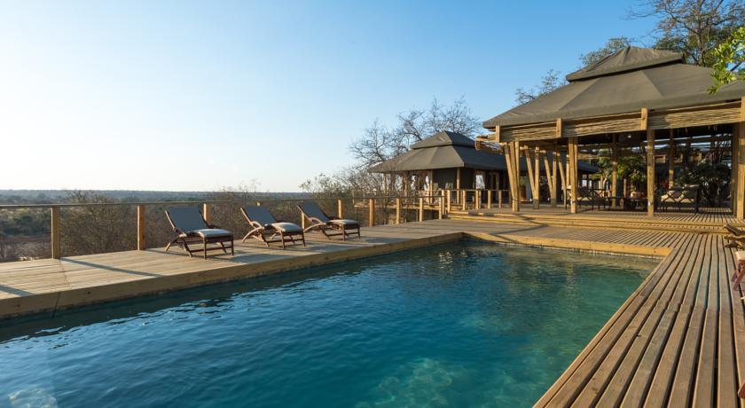 Отель Simbavati Hilltop Lodge
