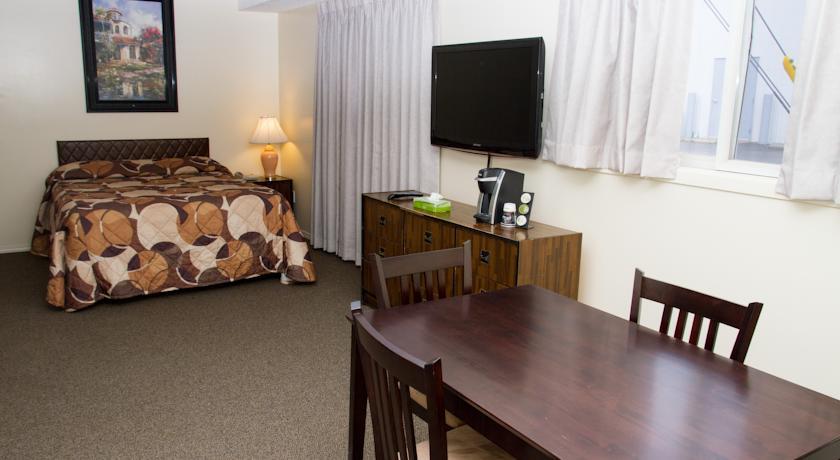 Отель Wheel Inn Motel