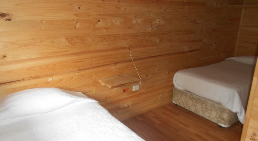 Отель Cabañas Del Huairavo