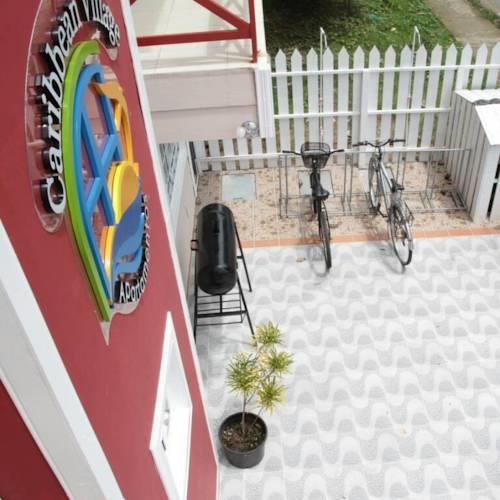 Апартаменты Caribbean Village Apartments