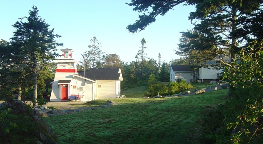 Отель Sluice Point Cottages