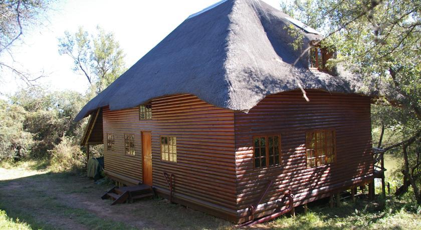 Отель Fish Eagle Log Cabin