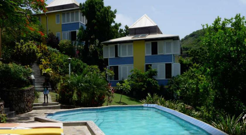 Апартаменты Sugarapple Inn