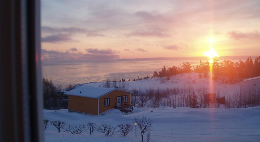 Отель Les Chalets au Bord de la Mer