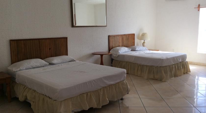 Отель Caye Harbour Lodge