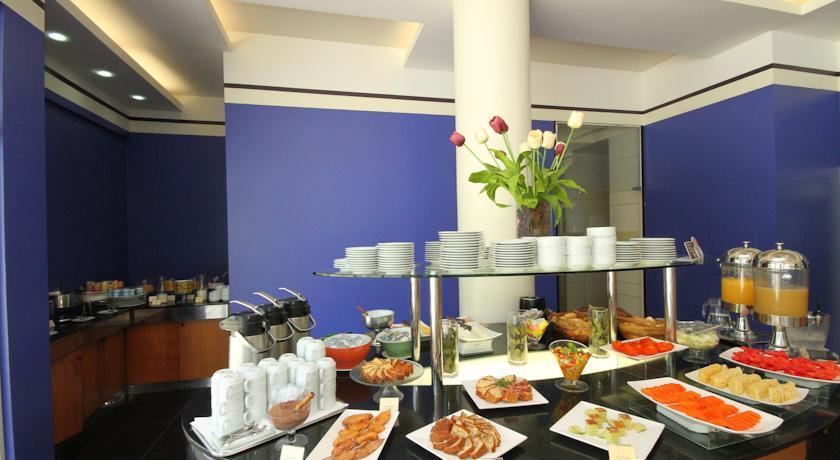Отель Promenade Paradiso All Suites