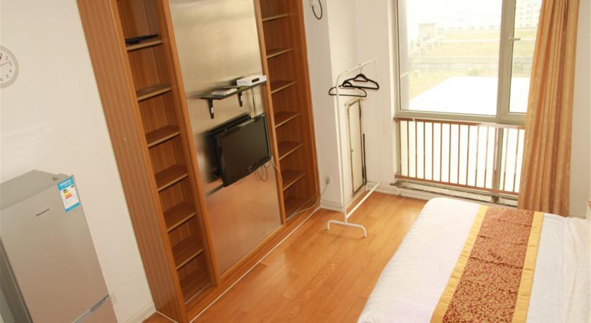 Апартаменты Shanghai Weide Apartment