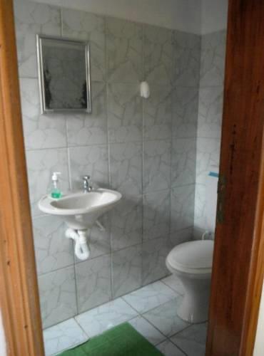 Гостевой дом Abelhinhas Residencial Camburi Pousada