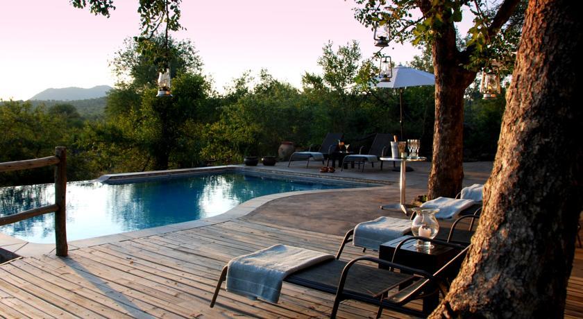 Отель Mbizi Bush Lodge