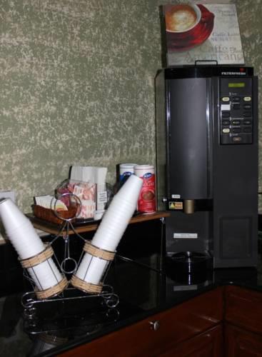 Отель Quarters Inn & Suites