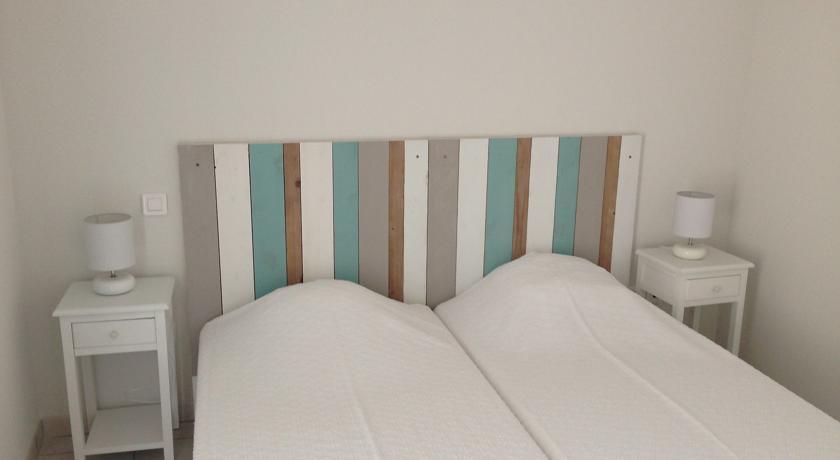 Апартаменты Four-Bedroom Holiday Home Plage Océane 1