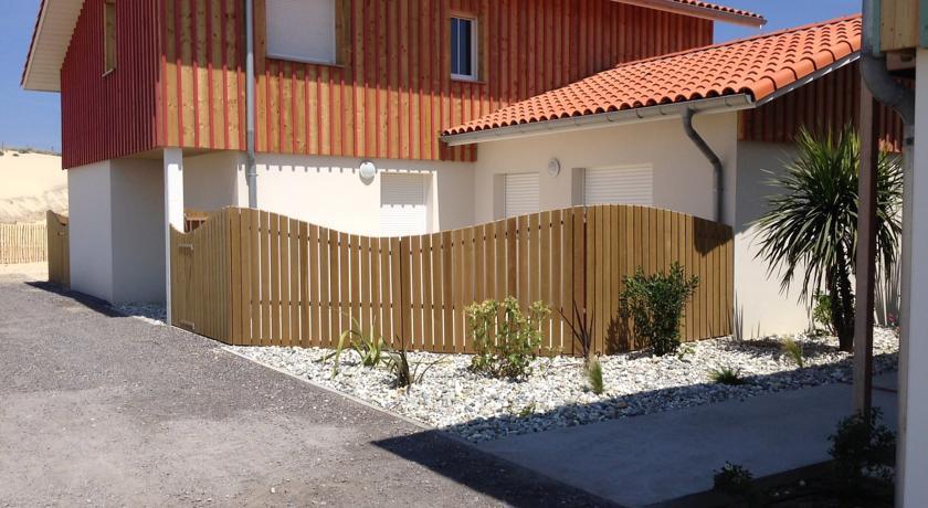 Апартаменты Four-Bedroom Holiday Home Plage Océane 2