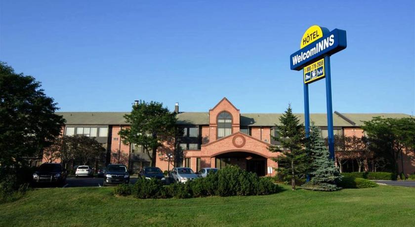 Отель Hôtel WelcomInns