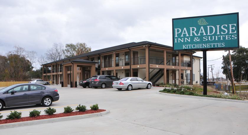 Отель Paradise Inn & Suites