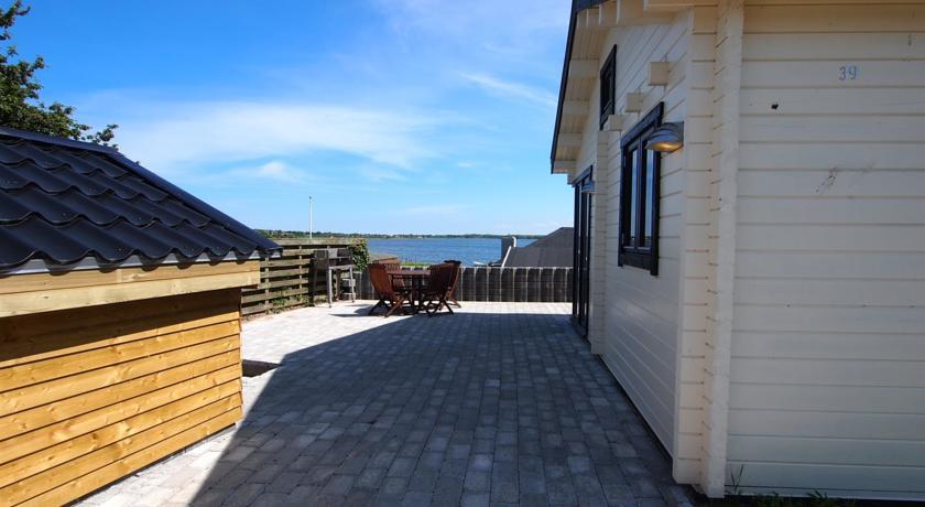 Апартаменты Holiday home Strandlysthuse A- 4573