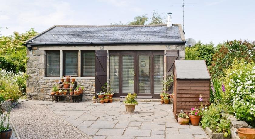 Апартаменты Coachmans Cottage