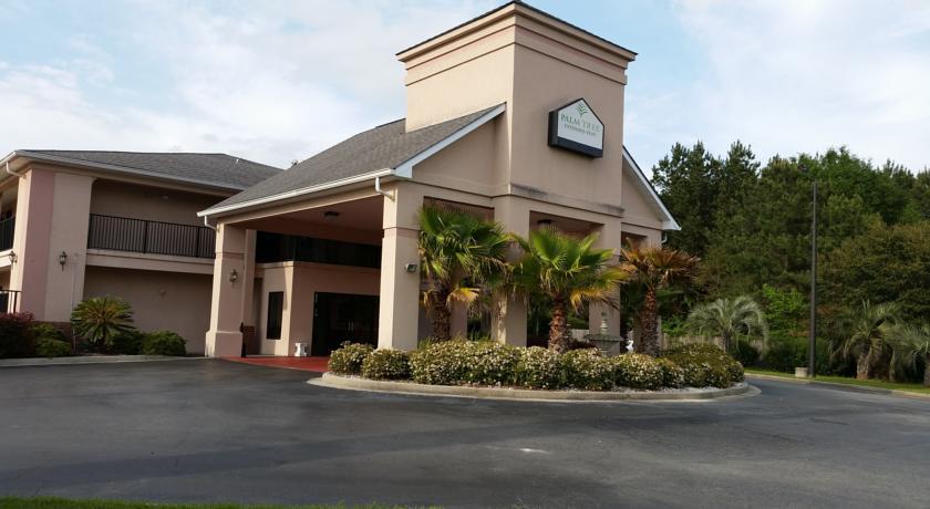 Отель Palm Tree Inn Extended Stay