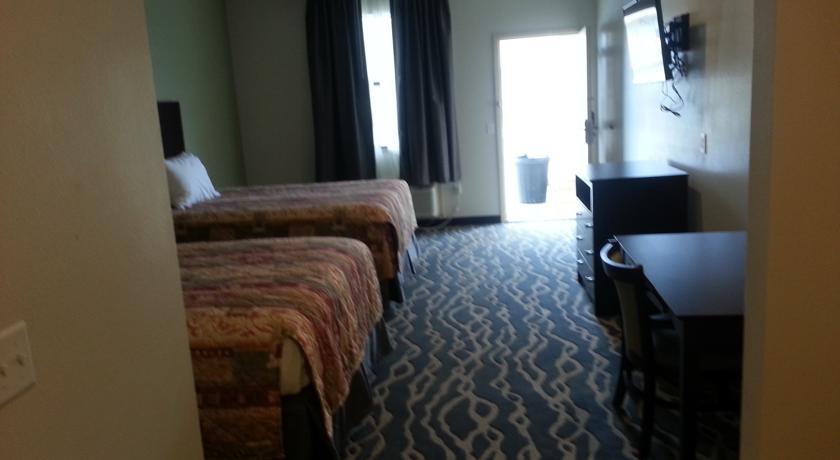 Отель Big Lake Inn and Suites