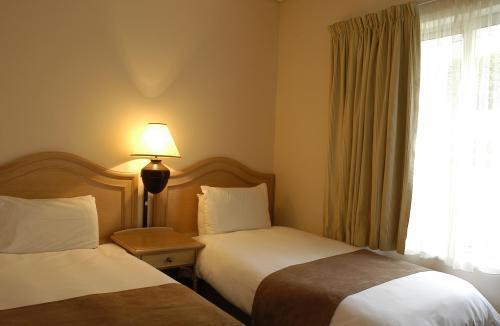 Отель Dolphin Beach Hotel