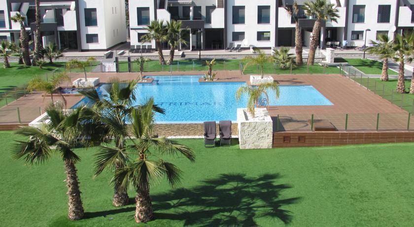 Апартаменты Bungaló Oasis Beach