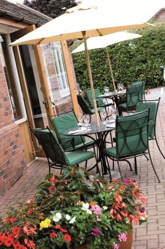 Отель Cottons - A Shire Hotel & Spa