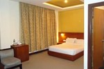 Отель Suhim Portico Hotel & Resort