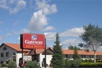 Отель Gateway Inn and Suites