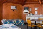 Отель Wunpalm Motel & Holiday Cabins