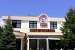 Отель Gold Capitol International Motel