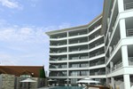 Отель Pinnacle Grand Jomtien Resort & Spa
