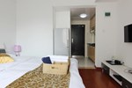 Апартаменты Tujia Sweetome Vacation Apartments (Yantai Yindu New City Plaza)