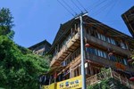 Отель Longsheng Longji Traveler Guesthouse