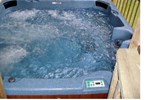 Отель Blue Mountain Rentals - Five-Bedroom Chalet with Outdoor Hot Tub