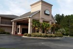 Отель Palm Tree Inn Extended Stay