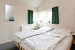 Апартаменты Three-Bedroom Holiday home in Otterndorf 18