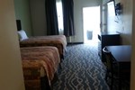Отель Big Lake Inn and Suites
