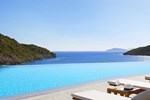 Отель Daios Cove Luxury Resort & Villas