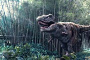 Тираннозавр будет провожать глазами посетителей парка. // cityofarabiame.com