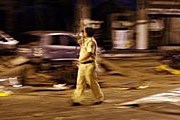 Полиция патрулирует улицы Мумбаи. // AFP