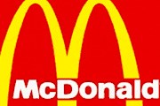 McDonald's разместится по соседству со входом в Лувр. // Логотип компании