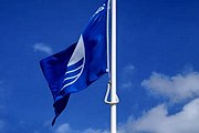 "Голубые флаги" появятся на польских пляжах в июле. // dawlishwarren.info