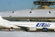 Самолет UTair у нового терминала Внуково // Travel.ru